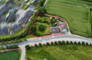 Grundstück zu kaufen in 23769 Fehmarn, voll erschlossenes Baugrundstück in Burg mit großem Wohnhaus und Nebengebäuden