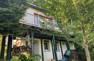Haus kaufen in 09579 Grünhainichen, Massiv gebautes Ferienhäuschen mit Kamin und wunderbarer Aussicht auf eigenem Grundstück