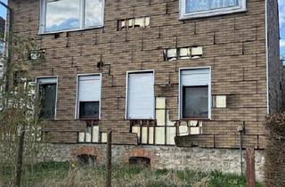 Einfamilienhaus kaufen in 38378 Warberg, Warberg - Sanierungsobjekt mit Charme