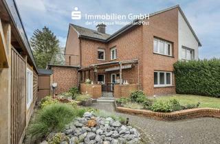 Haus kaufen in 59269 Beckum, Beckum - Zweifamilienhaus mit vielseitigen Möglichkeiten!