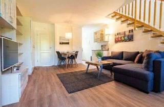 Wohnung kaufen in 18556 Dranske, Moderne 3-Zimmer-Maisonette Wohnung mit sonniger West-Terrasse und Blick ins Grüne