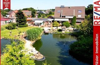 Mehrfamilienhaus kaufen in 26835 Schwerinsdorf, Mehrfamilienhaus * 4 Wohneinheiten * traumhafter Garten * Teichanlagen * 1 Wohneinheit vermietet *
