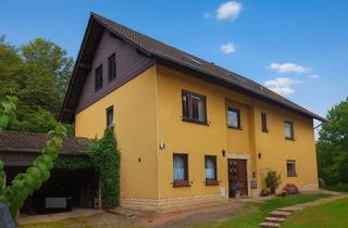 Einfamilienhaus kaufen in Bilsteinstraße 2 a, 37284 Waldkappel, Einfamilienhaus mit zwei Einliegerwohnungen und zusätzlichem Ausbaupotenzial in Waldkappel-Harmuthsa