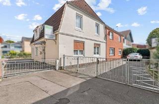 Mehrfamilienhaus kaufen in 25761 Büsum, Charmantes Mehrfamilienhaus mit Gästepension - Ihre Chance auf Rendite und Potenzial auf Eigenland