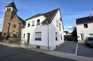 Einfamilienhaus kaufen in 56656 Brohl-Lützing, Freistehendes Einfamilienhaus mit Garten im Ortskern von Brohl-Lützing