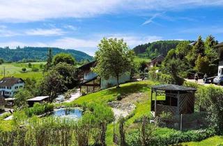 Einfamilienhaus kaufen in Buchenacker 12, 79692 Kleines Wiesental, Kleines Wiesental - Traumhaftes, lichtdurchflutetes Einfamilienhaus mit Fernblick, Teich & zweitem Baugrundstück