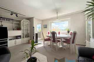 Wohnung kaufen in 90522 Oberasbach, Attraktive 3-Zimmer Wohnung mit Balkon und Blick ins Grüne