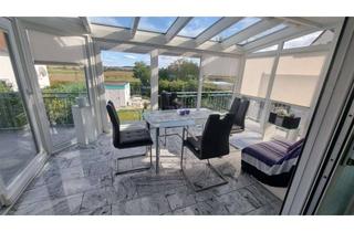 Wohnung mieten in Wilhelm-Bechtold-Straße 1a, 61206 Wöllstadt, 3-Zimmer-Wohnung mit Wintergarten, Kamin und Garten