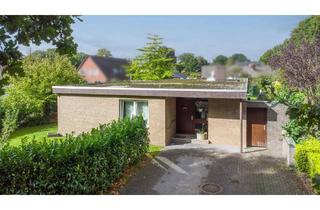 Haus kaufen in 26835 Hesel, Wohnen auf einer Ebene – 6-Zimmer-Bungalow mit großem Grundstück in zentraler Lage