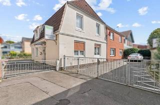 Mehrfamilienhaus kaufen in 25761 Büsum, Charmantes Mehrfamilienhaus mit Gästepension - Ihre Chance auf Rendite und Potenzial auf Eigenland