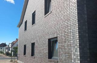 Wohnung kaufen in 26919 Brake, Brake - Wohnen mit Weitblick - 2 ZKB-Neubauwohnung im Dachgeschoss mit Balkon in begehrter Lage von Brake