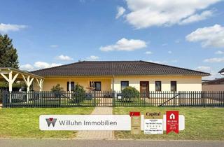 Haus kaufen in 04509 Löbnitz, Löbnitz - Einzigartiges Zweifamilienhaus im Bungalowstil | Wunderschönes Grundstück | Pool | Erdwärme
