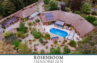 Haus kaufen in 26639 Wiesmoor, Einzigartiges Wohnensemble: Luxuriöser Bungalow mit Einliegerwohnung, Loungehaus und Pool