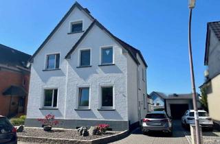 Mehrfamilienhaus kaufen in 59427 Unna, Attraktives Mehrfamilienhaus mit 3 Wohneinheiten, Garten und Garagen in idealer Lage von Unna-Massen