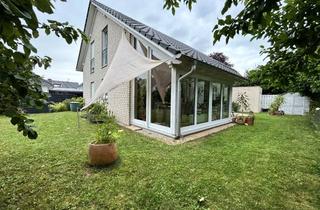 Einfamilienhaus kaufen in 61169 Friedberg, Charmantes Einfamilienhaus mit großzügigem Wintergarten.