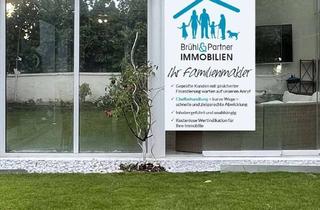 Doppelhaushälfte kaufen in 65479 Raunheim, Geräumige und helle Doppelhaushälfte mit tollem Garten und Gewerbemöglichkeit