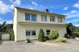 Haus kaufen in 59609 Anröchte, Viel Platz für die Familie oder auch Generationen! Solides Ein-/Zweifamilienhaus mit Garage in Anröchte-Mellrich!