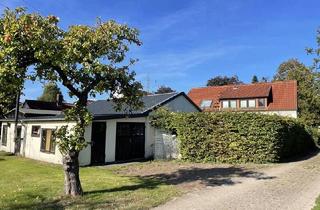 Haus kaufen in 28790 Schwanewede, Schwanewede - Teilvermietetes Zweifamilienhaus inkl. Baugrundstück in Schwanewede-Beckedorf zu verkaufen