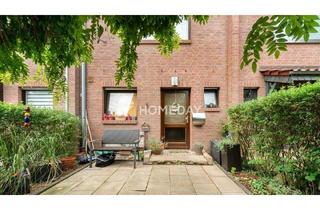 Reihenhaus kaufen in 40764 Langenfeld, Langenfeld (Rheinland) - Charmantes Reihenhaus mit zwei Terrassen und moderner Ausstattung