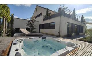 Einfamilienhaus kaufen in 63691 Ranstadt, Ranstadt - Feldrandlage & Wellness: Modernes Einfamilienhaus mit A+ Energieklasse