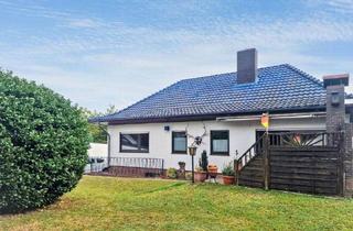 Haus kaufen in 31618 Liebenau, Liebenau - Bungalow in Liebenau mit schönem Grundstück, Garage und Vollkeller