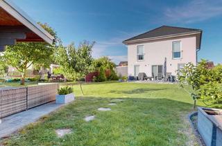 Villa kaufen in 15749 Mittenwalde, Neuwertige Stadtvilla mit 5 Zimmern, Doppelcarport & gepflegtem Außenbereich