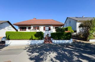 Einfamilienhaus kaufen in 65589 Hadamar, Exklusives Einfamilienhaus auf einer Ebene mit Wellnessbereich, Gartenparadies und Fernsicht!