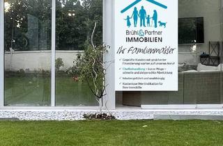 Doppelhaushälfte kaufen in 65479 Raunheim, Raunheim - Geräumige und helle Doppelhaushälfte mit tollem Garten und Gewerbemöglichkeit