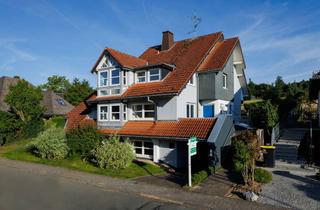 Villa kaufen in Baumgartenstraße 43, 65232 Taunusstein, Zweifamilienvilla in Feldrandlage - Ideal für Familien oder Generationenwohnen