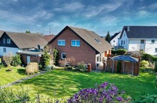 Doppelhaushälfte kaufen in 32791 Lage, Wohnen mit Gartenfreude: Doppelhaushälfte in Sackgassenlage