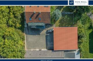 Haus kaufen in 84307 Eggenfelden, Großzügiges Zweifamilienhaus mit großem Grundstück und vielseitigen Nebengebäuden