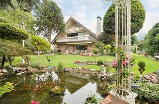 Einfamilienhaus kaufen in 46459 Rees, Großzügiges Einfamilienhaus mit Wintergarten und liebevoll gestaltetem Garten in Rees-Millingen