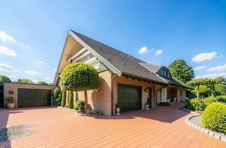 Einfamilienhaus kaufen in 46459 Rees, Großzügiges Einfamilienhaus mit Wintergarten und liebevoll gestaltetem Garten in Rees-Millingen