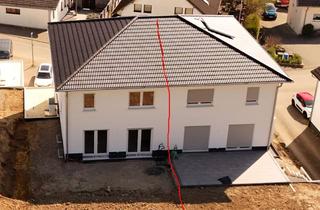 Haus kaufen in 53578 Windhagen, Große DHH mit Garage und schönem Grundstück zu verkaufen