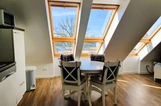 Wohnung kaufen in 23970 Wismar-Nord, Ansprechende 2,5-Zimmer-DG-Wohnung mit gehobener Innenausstattung mit EBK in Wismar