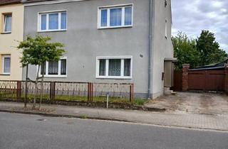 Mehrfamilienhaus kaufen in 18507 Grimmen, Grimmen - Mehrfamilienhaus mit großem Garten