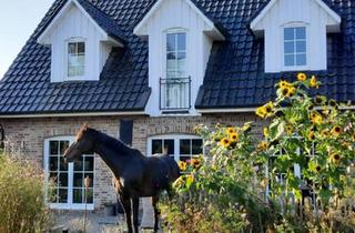 Einfamilienhaus kaufen in 21629 Neu Wulmstorf, Neu Wulmstorf - Einfamilienhaus im Friesenstil mit Doppelgarage und Garten