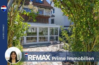 Wohnung kaufen in 85221 Dachau, Charmante Maisonette auf zweiEbenen – mit Wintergarten undGarten zum Genießen