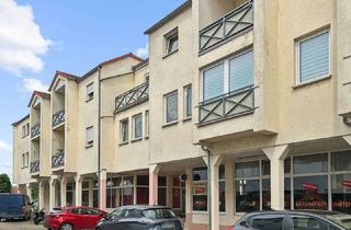 Wohnung kaufen in 01640 Coswig, 5,4% Rendite - Dachgeschosswohnung mit Balkon und Tiefgaragenstellplatz in Coswig