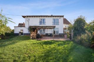 Einfamilienhaus kaufen in 66892 Bruchmühlbach-Miesau, Tradition trifft Moderne – einzigartiges Einfamilienhaus mit Garten und nachhaltiger Energielösung