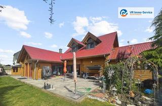 Haus kaufen in 97337 Dettelbach, Wohnen im Einklang mit der Natur – Massivholzhaus mit Gartenidylle