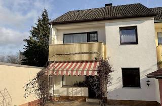 Einfamilienhaus kaufen in 60437 Nieder-Eschbach, Großes Reiheneckhaus mit Ausbaureserve, Balkon, sonnigem Garten und Garage am Haus