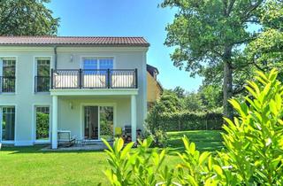 Wohnung kaufen in 82131 Gauting, GAUTING: DESIGN TRIFFT NATUR - MODERNE MAISONETTE MIT GROSSEM GARTEN IN TOPLAGE!