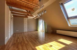 Wohnung kaufen in 38239 Thiede, Lichtdurchflutete Dachgeschosswohnung mit Gartenanteil!