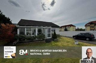 Haus kaufen in 06766 Bitterfeld-Wolfen, Wohnglück auf einer Ebene – charmanter Bungalow mit Wintergarten & Gartenidylle