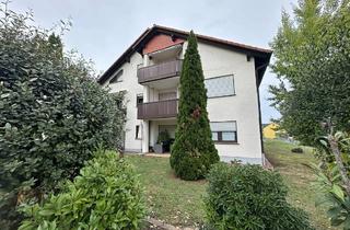 Wohnung kaufen in 63939 Wörth, Vermietete 3-Zimmer-Erdgeschosswohnung mit Terrasse und Gartenzugang