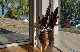 Wohnung kaufen in 35606 Solms, Solms - Gartenwohnung in Hausgemeinschaft, ruhige Lage, Erstbezug