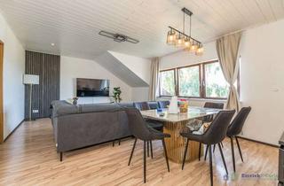 Wohnung kaufen in 55262 Heidesheim, Dachgeschosswohnung mit Garten & Ausblick in Heidesheim am Rhein