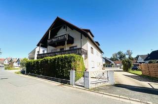 Wohnung kaufen in 91341 Röttenbach, Wohntraum mit zwei Einheiten - Ihr neues Domizil in Röttenbach