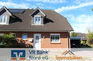 Doppelhaushälfte kaufen in 25917 Leck, Ausgesprochen gepflegte Doppelhaushälfte mit Garage in schöner Wohnlage